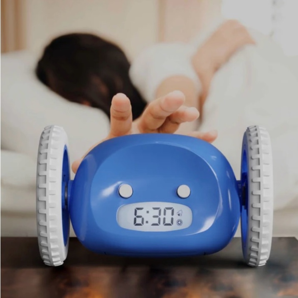 CLOCKY Extra Loud Alarm Clock for Heavy Sleepers on Wheels Rolls Runs Away